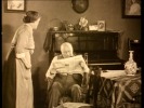 The Lodger (1927)Marie Ault and newspaper